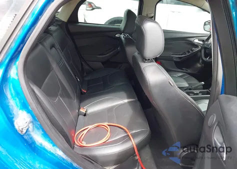 2015 Ford Focus Titanium from USA, damaged, VIN 1FADP3J27FL287249